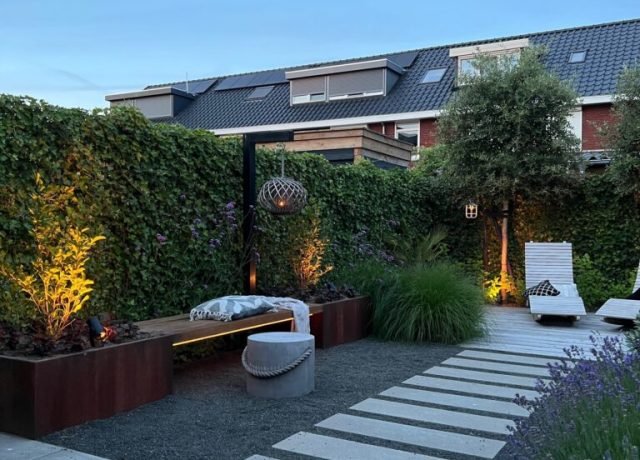 Modern patio with paving stones and decorative garden lighting